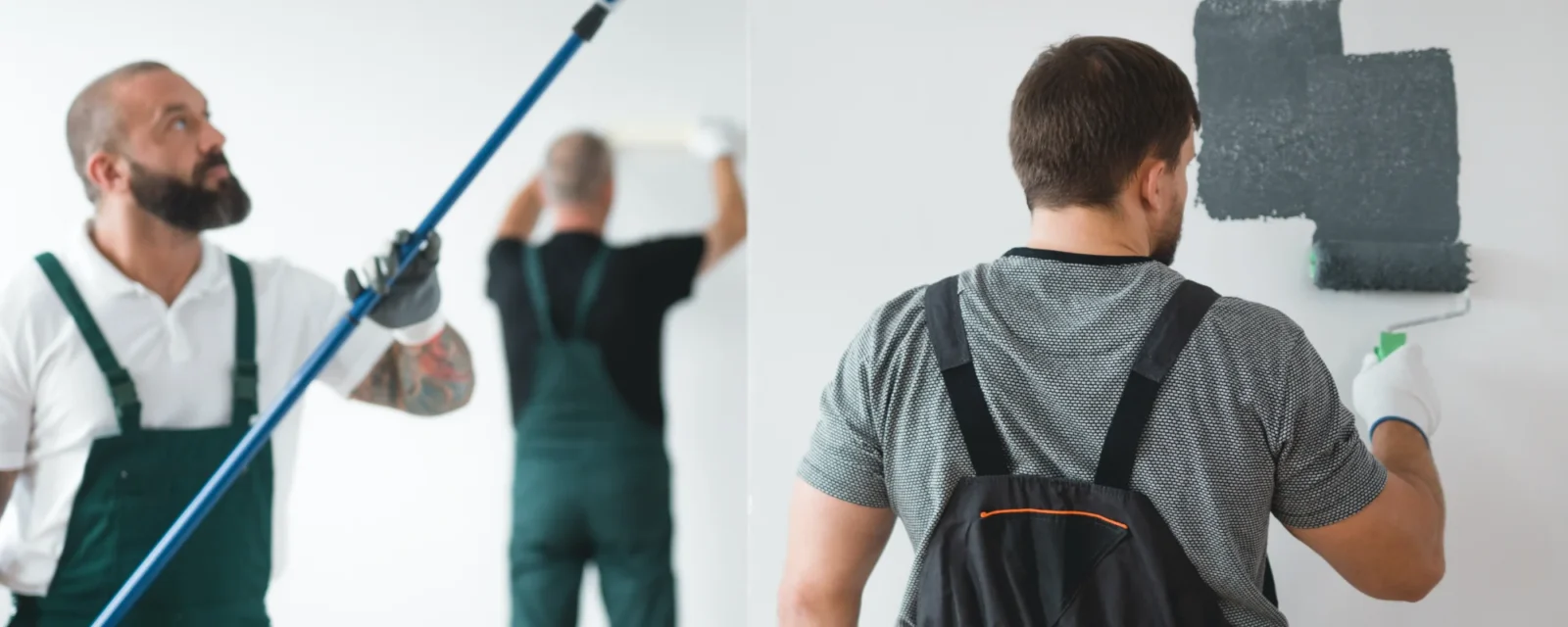 Three professional painters apply dark gray paint to a white interior wall. One man holds a roller extension pole, and the other uses a roller on the wall.